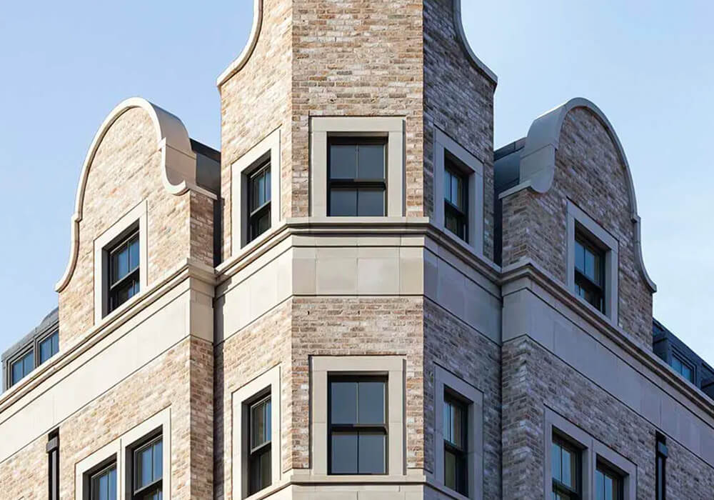 City building with black sliding sash windows