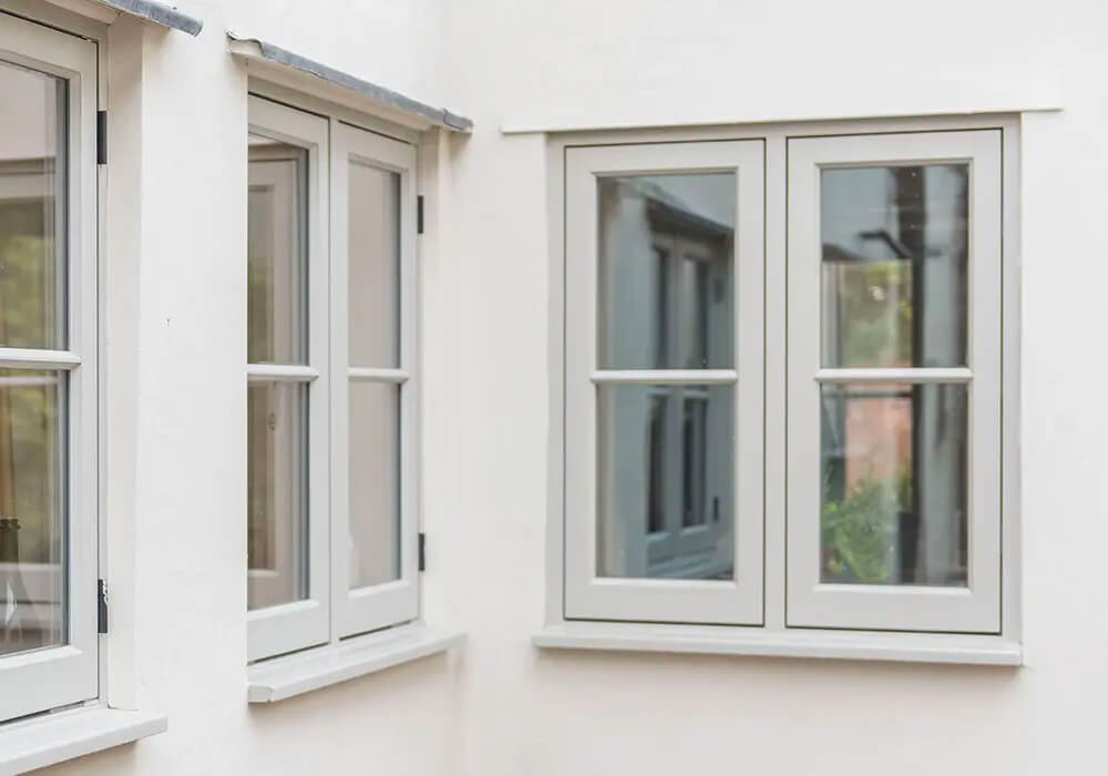 Grey timber flush casement windows