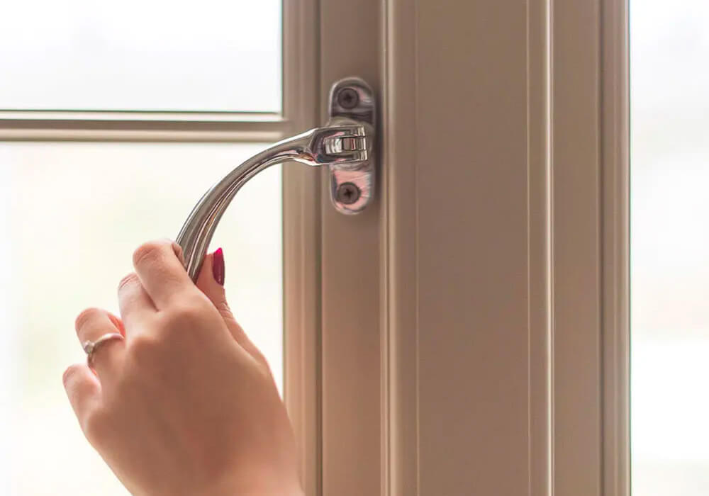 Close up of a timber window handle