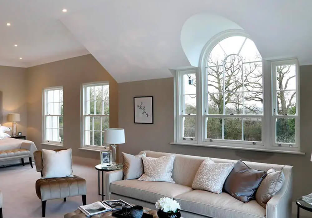 Bedroom with sliding sash windows and a timber bespoke window