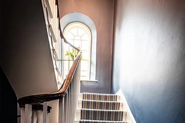 Stairs up to a bespoke window